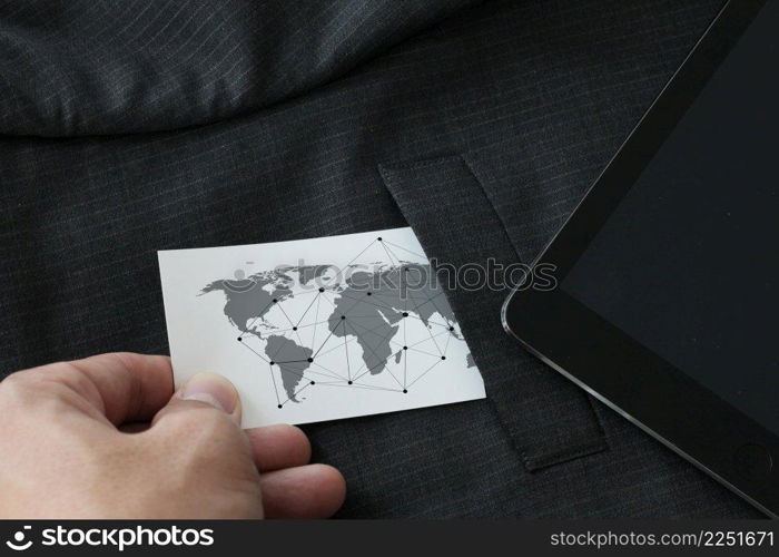 close up of businessman hand picking business card with social media diagram concept from the pocket of gray suit jacket background