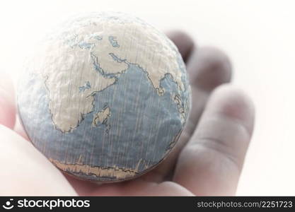 close up of businessman hand showing texture the world concept Elements of this image furnished by NASA