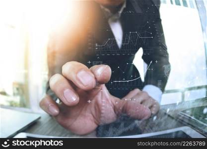 close up of businessman hand working with financial interface and digital key performance indicators as concept