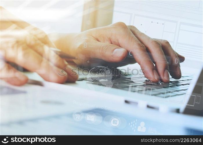 close up of businessman hand working with new modern computer and digital business strategy diagram as concept