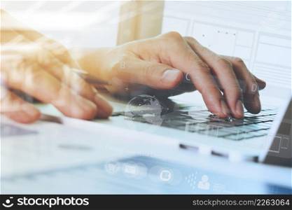 close up of businessman hand working with new modern computer and digital business strategy diagram as concept