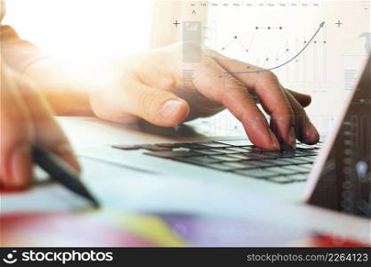 close up of businessman hand working with new modern computer with business strategy diagram