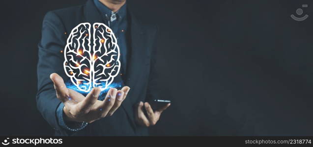 Close up of businessman holding digital image of brain in palm