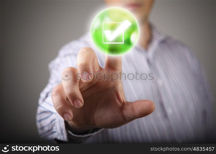 Close up of businessman touching making choice on media screen