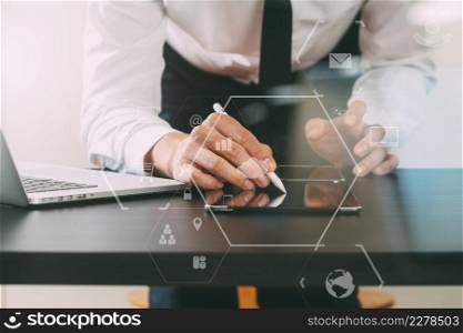 close up of businessman working with smart phone on wooden desk in modern office with virtual icon diagram