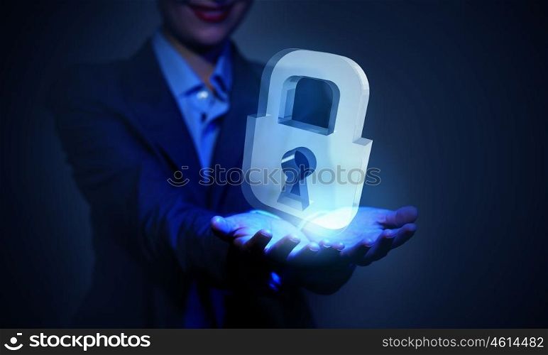 Close up of businesswoman hand holding digital icon in palm. Lock icon in palms