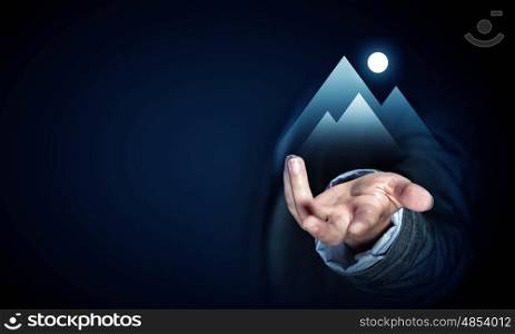 Close up of businesswoman hand holding digital icon in palm. Reach your top