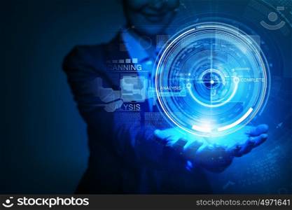Close up of businesswoman hand holding media concept icon. Media technologies in our hands