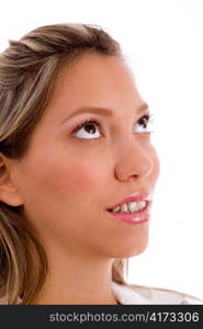 close up of businesswoman looking up on an isolated white background