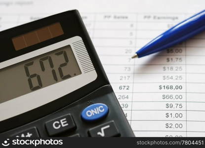 Close-up of calculator on financial documents. Financial analysis