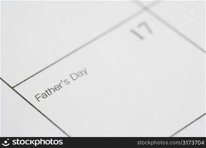 Close up of calendar displaying Fathers Day.