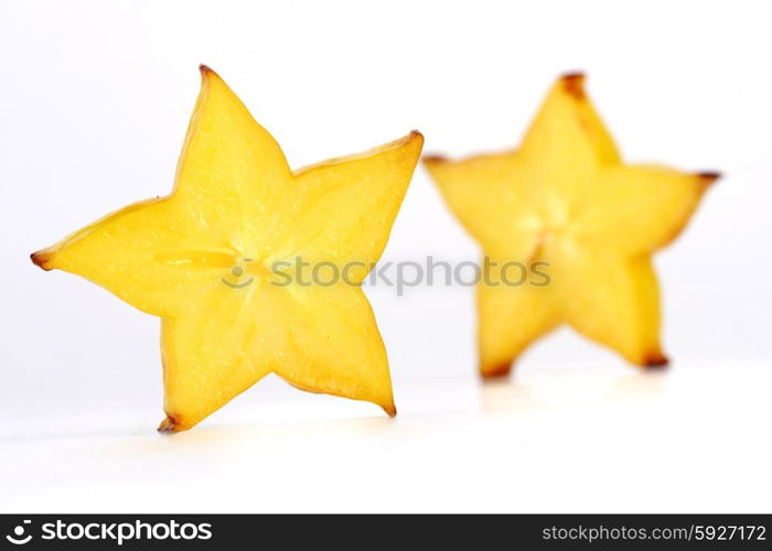 Close-up of carambola on white background