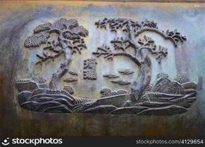 Close-up of carving on a decorative urn, Ho Chi Minh City, Vietnam