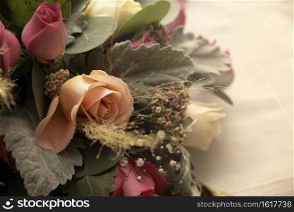 close up of centerpiece roses and foliage