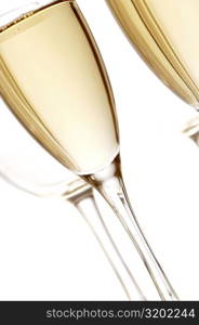 Close-up of champagne in two champagne flutes