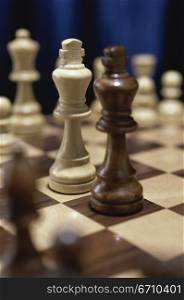 Close-up of chessmen on a chess board