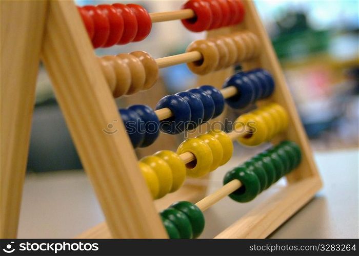 Close-up of child&acute;s abacus in classroom.