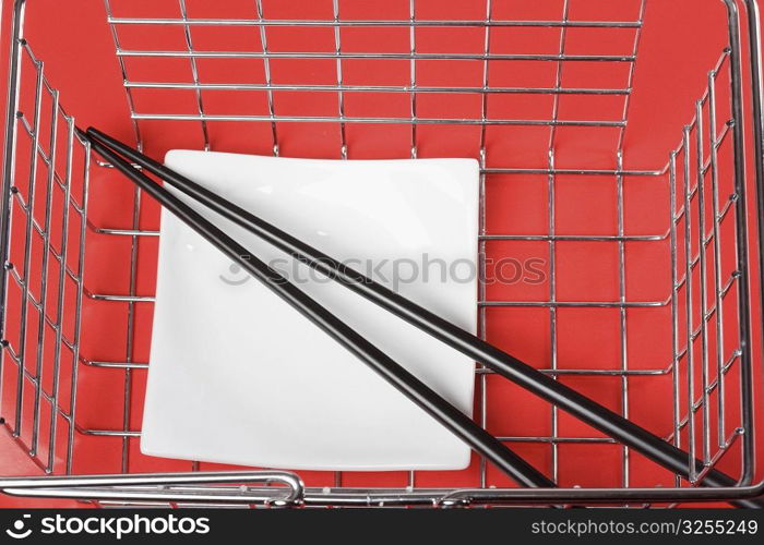 Close-up of chopsticks in a basket