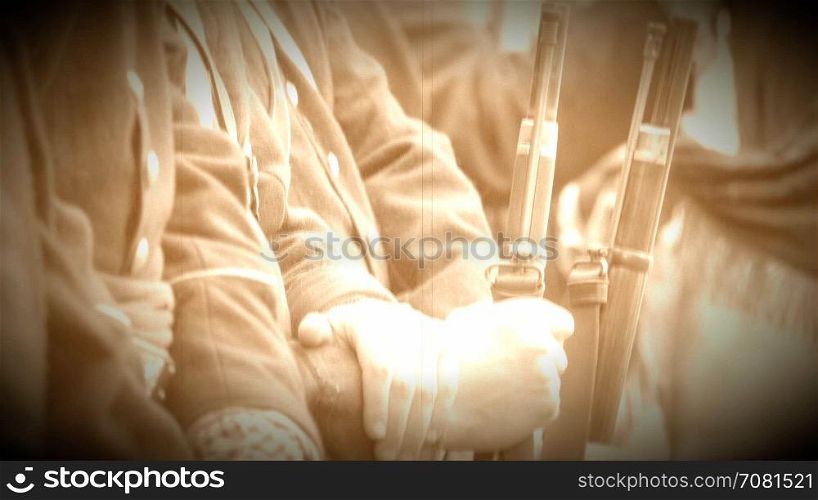 Close up of Civil War soldiers hands on guns (Archive Footage Version)