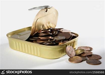 Close-up of coins in a lunch box