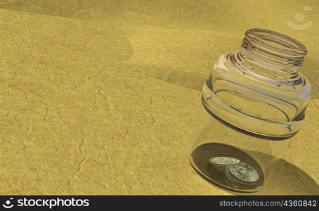 Close-up of coins in an open jar