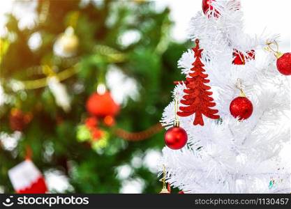 Close up of Colorful balls on White Christmas tree background Decoration During Christmas and New Year.