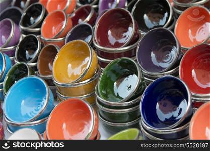 Close-up of colorful bowls for sale at market stall, Medina, Marrakesh, Morocco