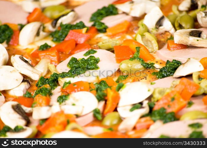 close up of colorful homemade pizza ready to be baked