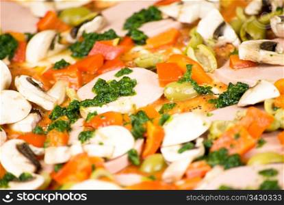 close up of colorful homemade pizza ready to be baked