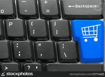Close-up of Computer keyboard, with blue Shopping key