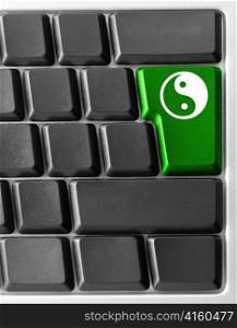 Close-up of Computer keyboard with yin yan key