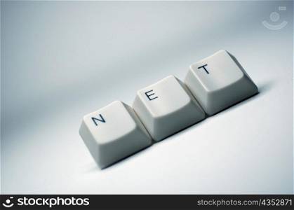Close-up of computer keys spelling the word net