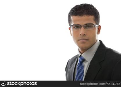 Close-up of confident businessman in glasses over white background