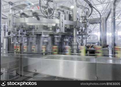 close-up of conveyor belt in motion at production and bottling of drinks in tin cans. production and bottling of drinks in tin cans. factory for bottling beverages in cans