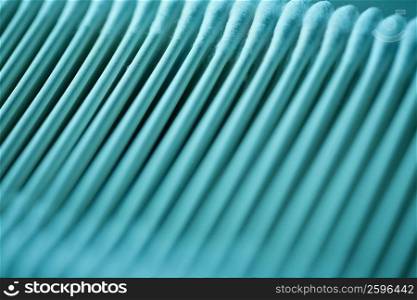 Close-up of cotton swabs in a row