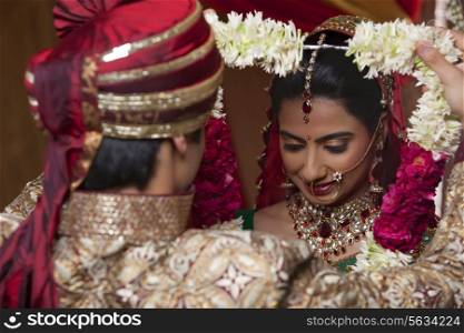 Close-up of couple during wedding ceremony
