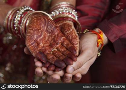 Close-up of couple&rsquo;s hand