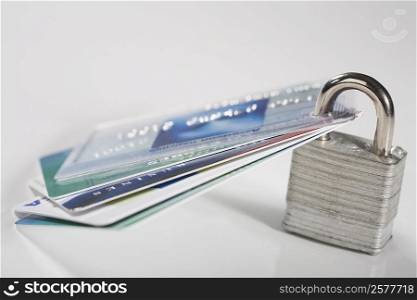 Close-up of credit cards with a padlock