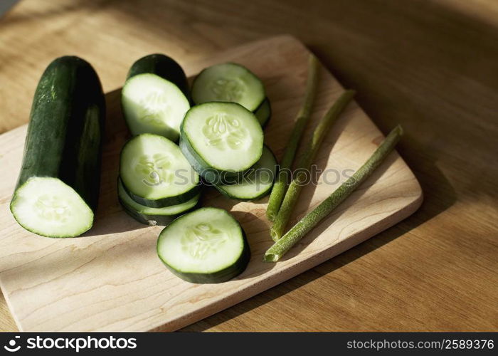 Close-up of cucumber slices on a cutting board