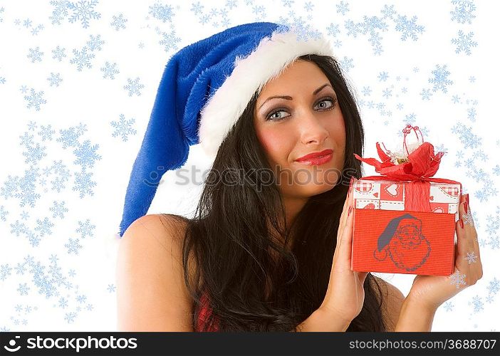close up of cute brunette with gift box and blue christmas hat