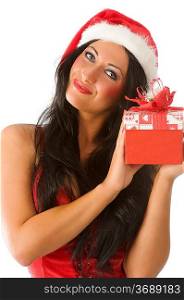 close up of cute brunette with gift box and christmas hat looking in camera
