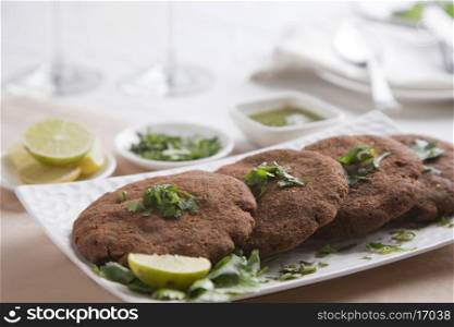 Close-up of cutlets arranged in plate