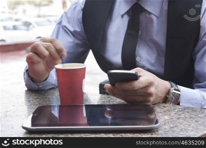Close-up of digital tablet , coffee and mobile phone , INDIA , DELHI
