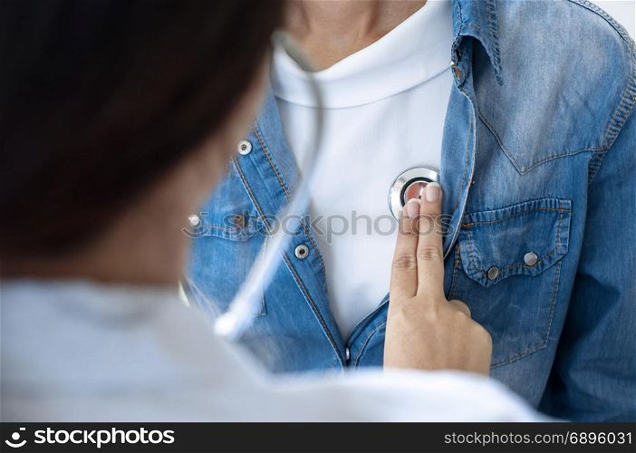 Close-up of doctor checking patient&rsquo;s vitals at a hospital