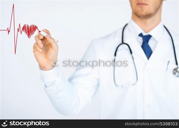 close up of doctor drawing electrocardiogram on virtual screen