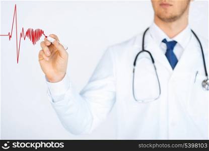close up of doctor drawing electrocardiogram on virtual screen