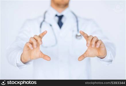 close up of doctor with holding something with hands