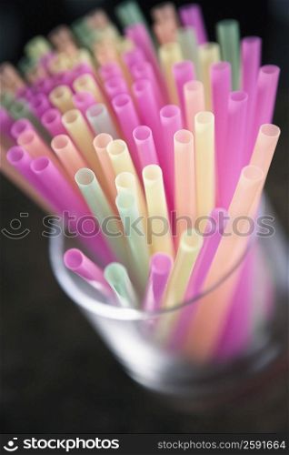 Close-up of drinking straws in a glass