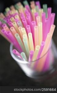 Close-up of drinking straws in a glass