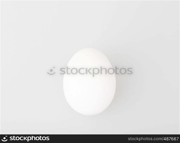 Close-Up Of Egg Over White Background